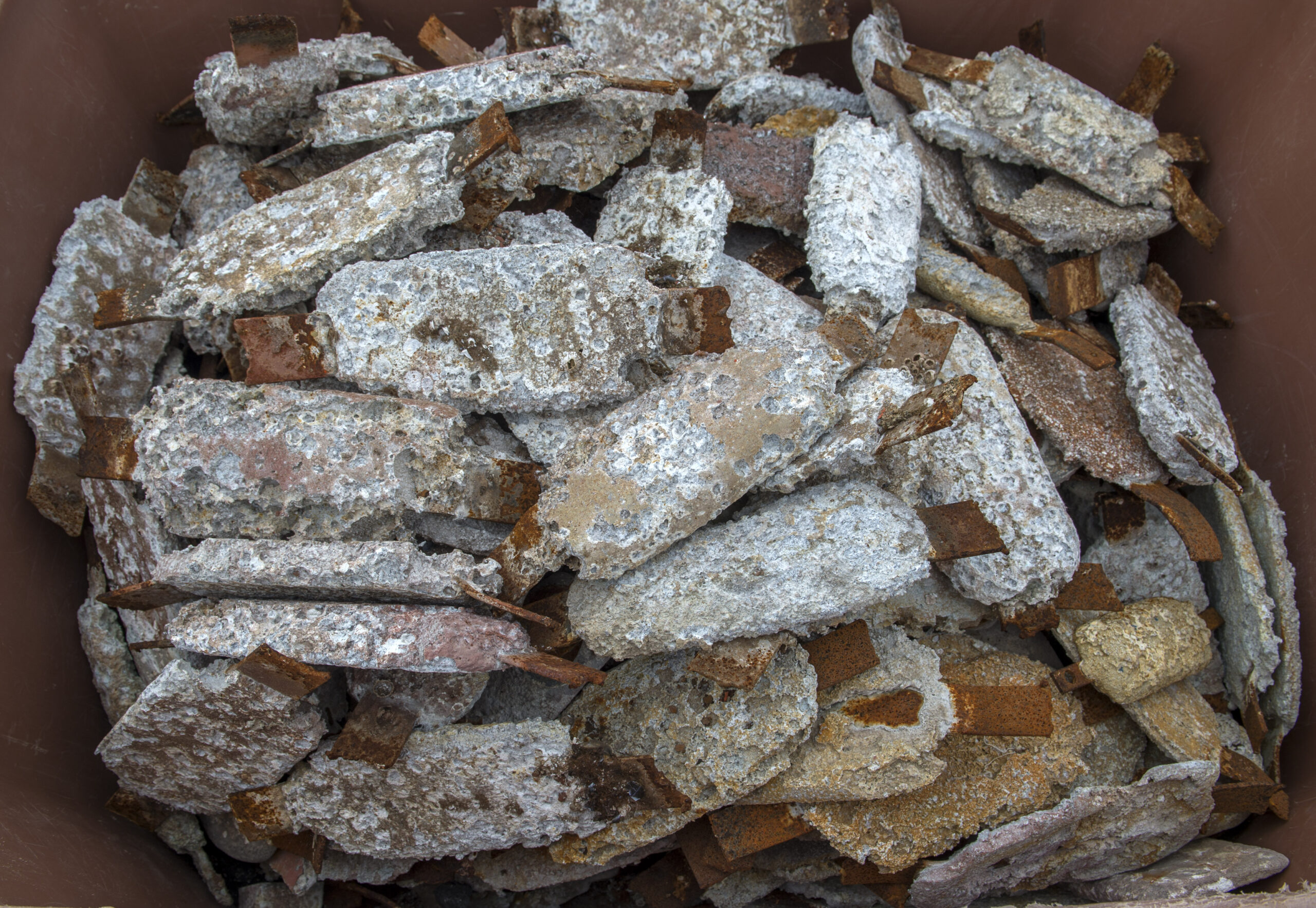 Used galvanic sacrificial anode showing consumption of the metal surface