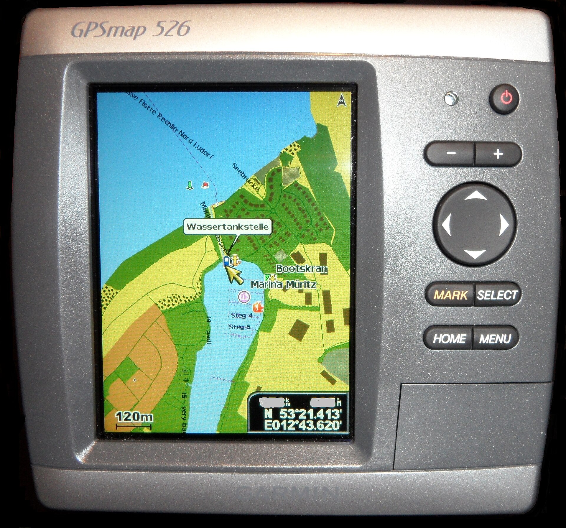Garmin GPSMAP chartplotter screen showing an electronic chart and vessel position symbol