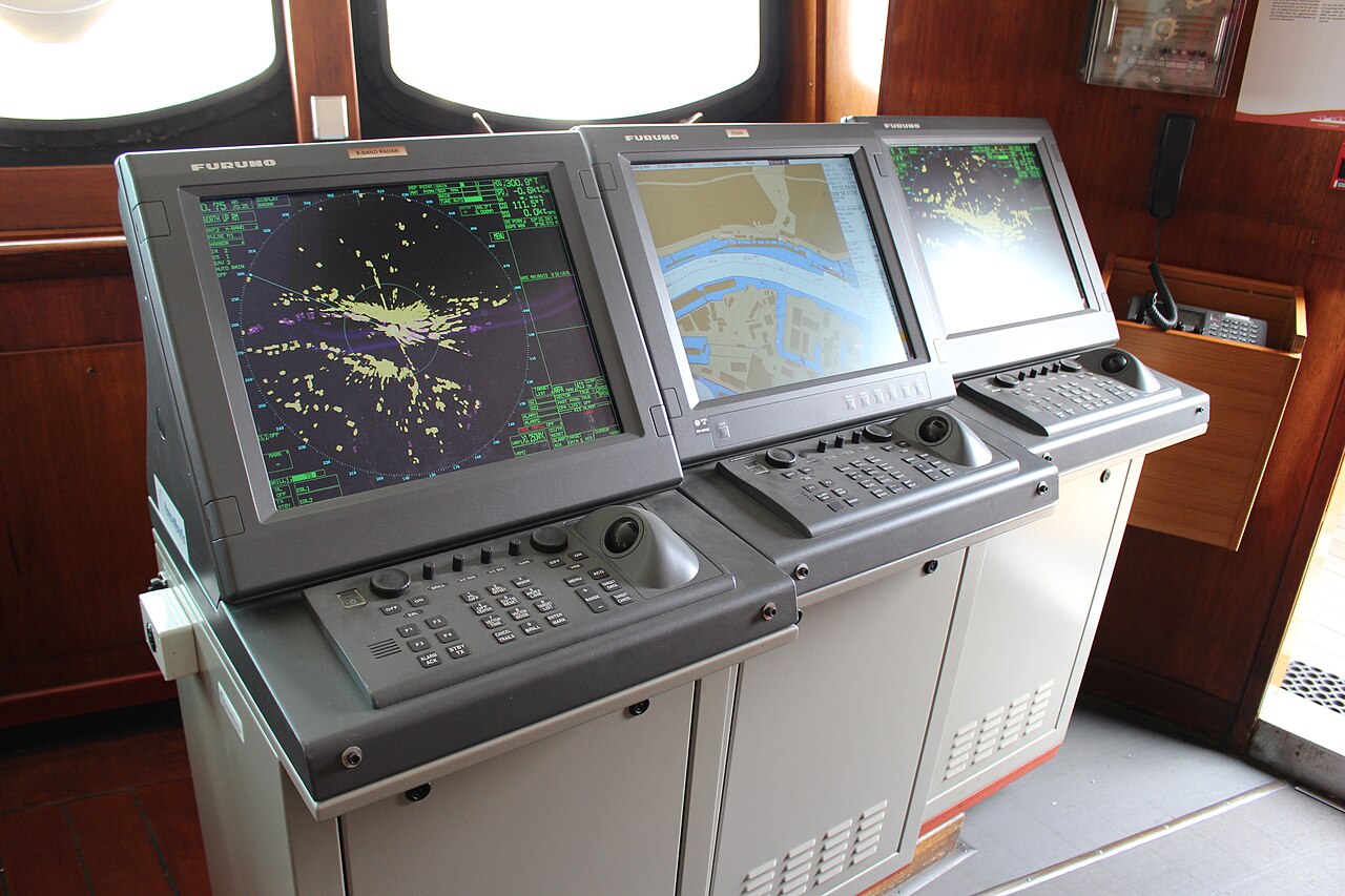 Ship bridge navigation displays including radar and electronic chart screens, illustrating a display surface rather than a specific AIS consumer brand