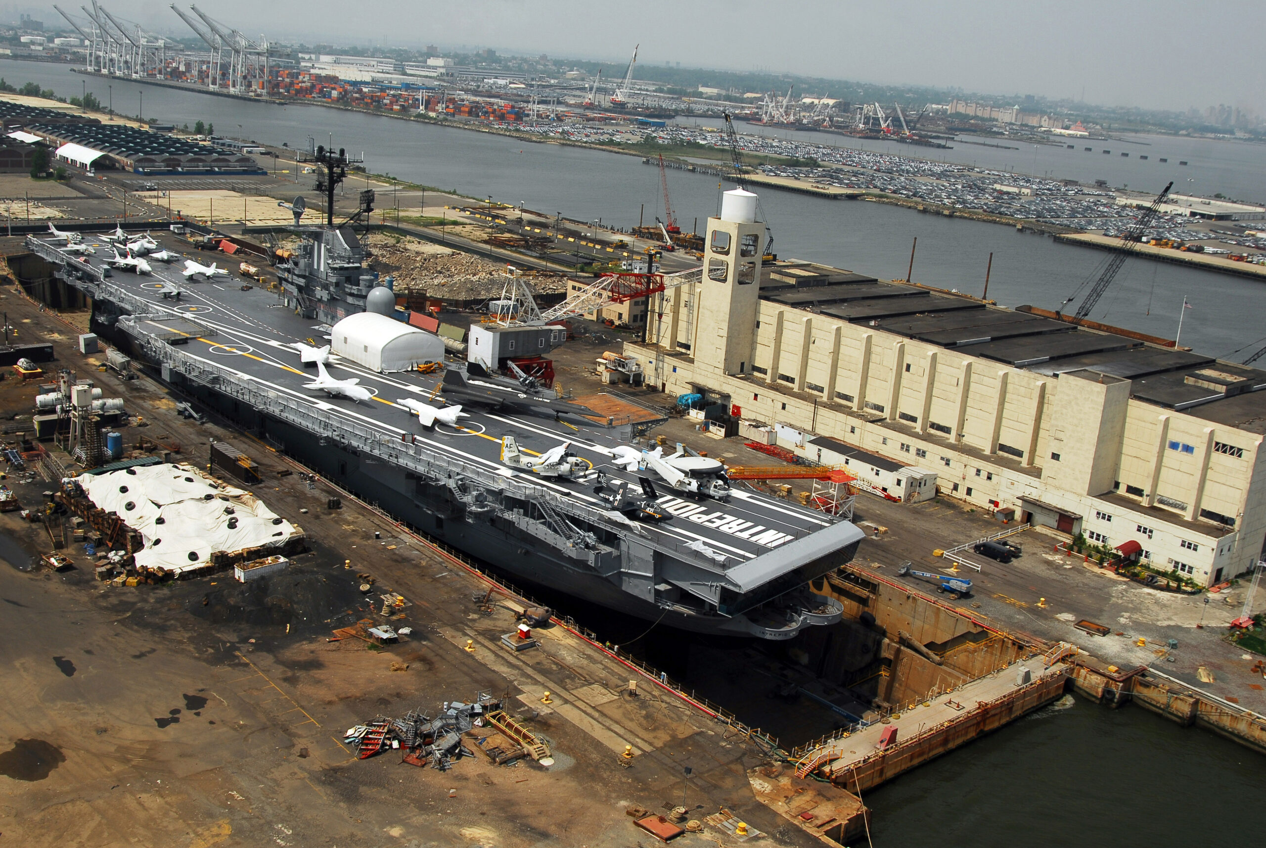 Ship hull paint and underwater body exposed in a dry dock, not an ROV underwater pass