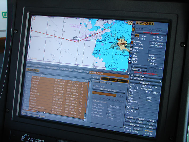 Electronic chart and navigation displays on a merchant-ship bridge consoles