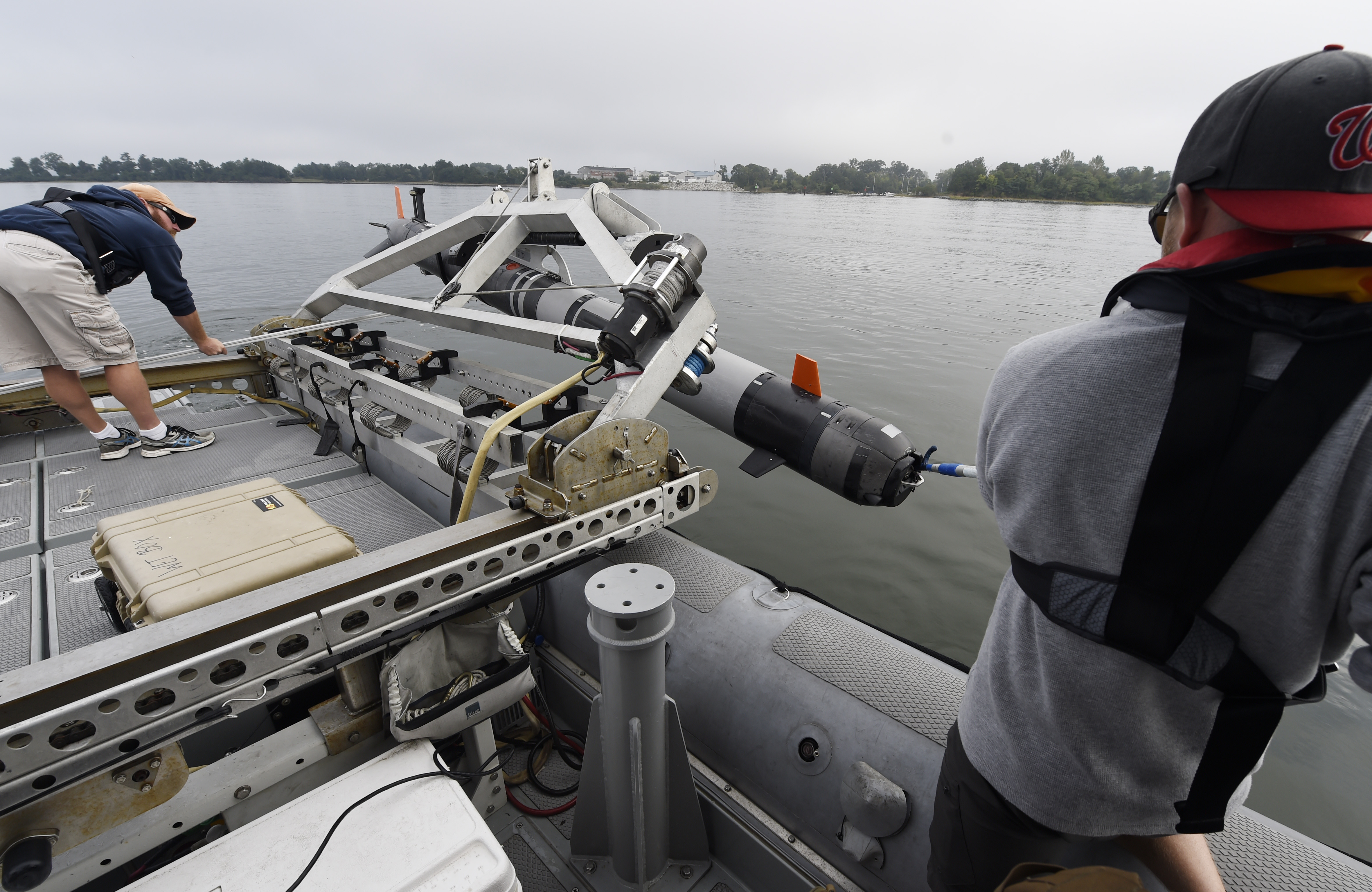 Unmanned undersea vehicle launching from a boat during a demonstration