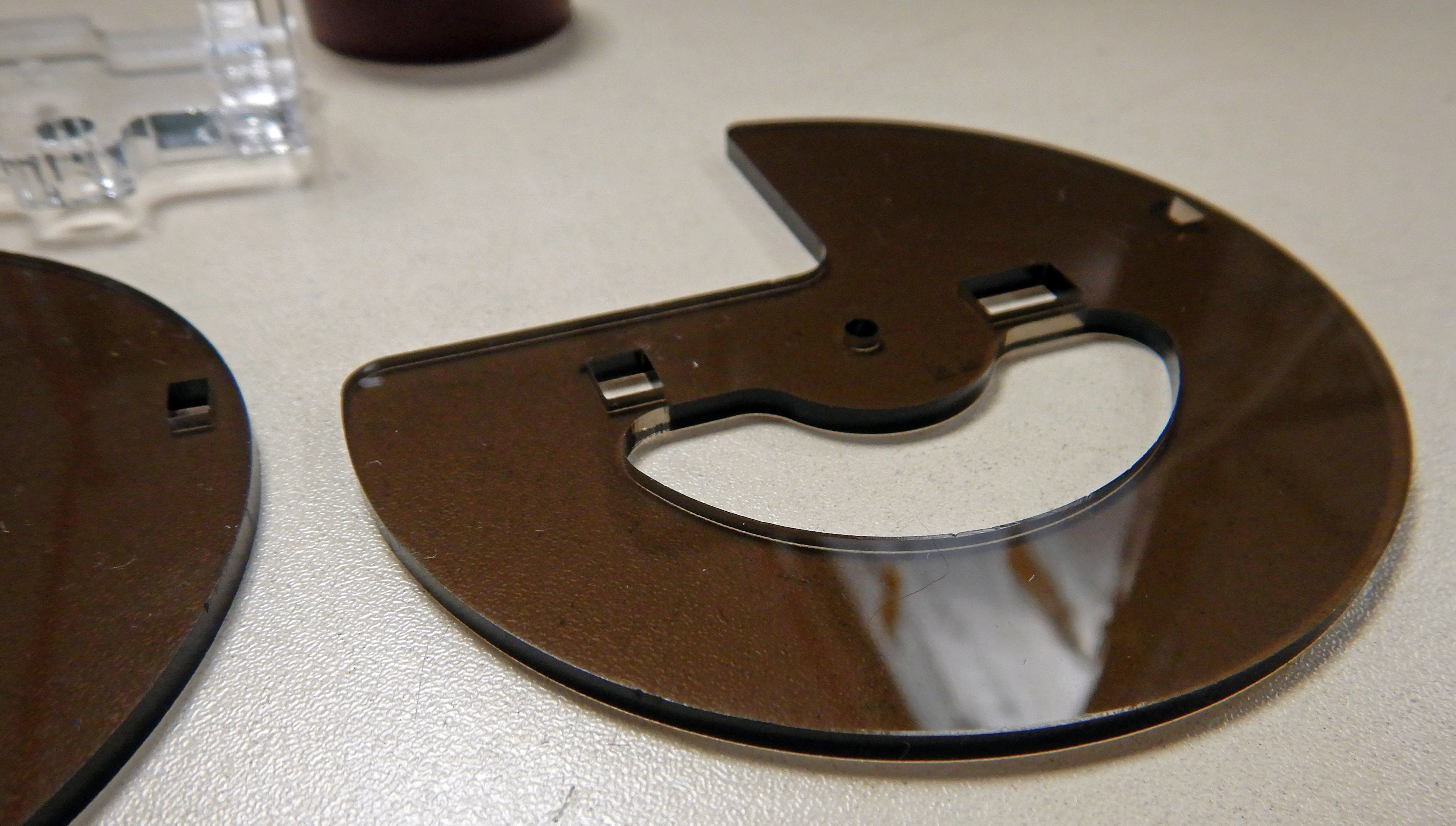 Pre-cut brown plexiglass acrylic parts for an OpenROV, not a BlueROV2