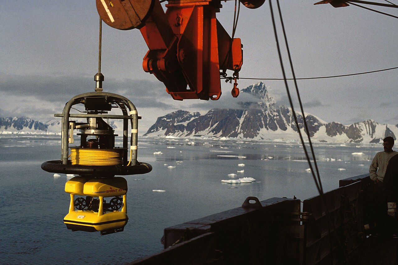 Remotely operated underwater vehicle being handled from a research ship deck